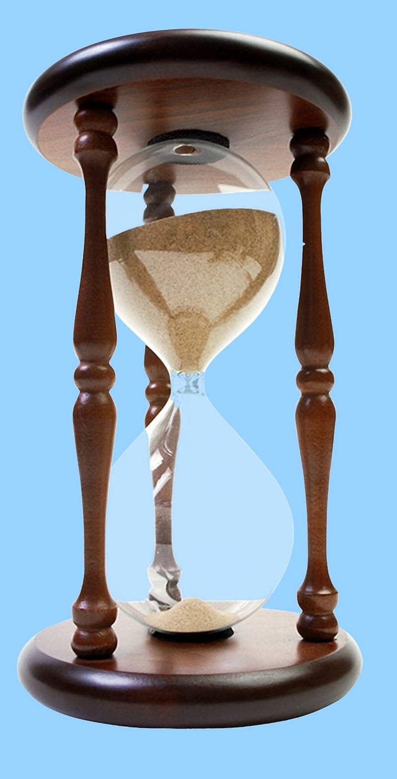 Hourglass in a surreal landscape